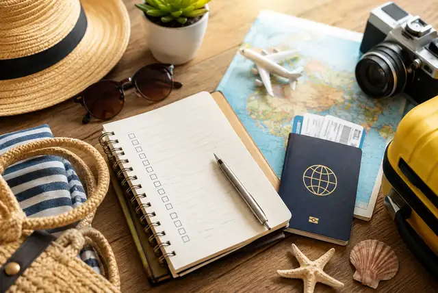 Summer holiday planning checklist with travel essentials and travel documents
