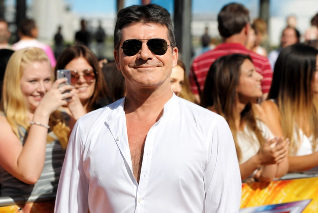 Simon Cowell at a television event in 2026 discussing his career, net worth, family, and latest projects