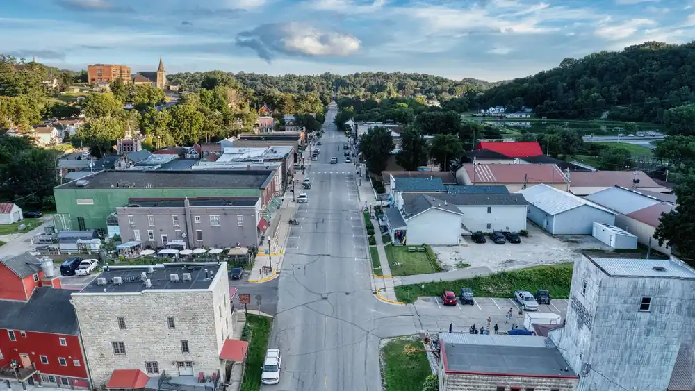 Aerial view of small town Lanesboro, Minnesota showcasing its charming downtown and surrounding greenery.