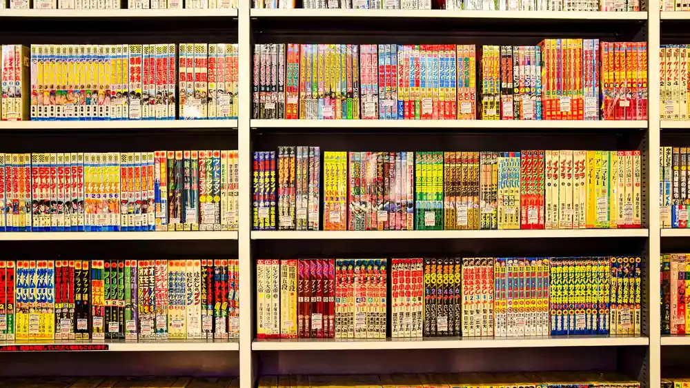 Vibrant shelves filled with Japanese manga in a bookstore. Perfect for comic enthusiasts.