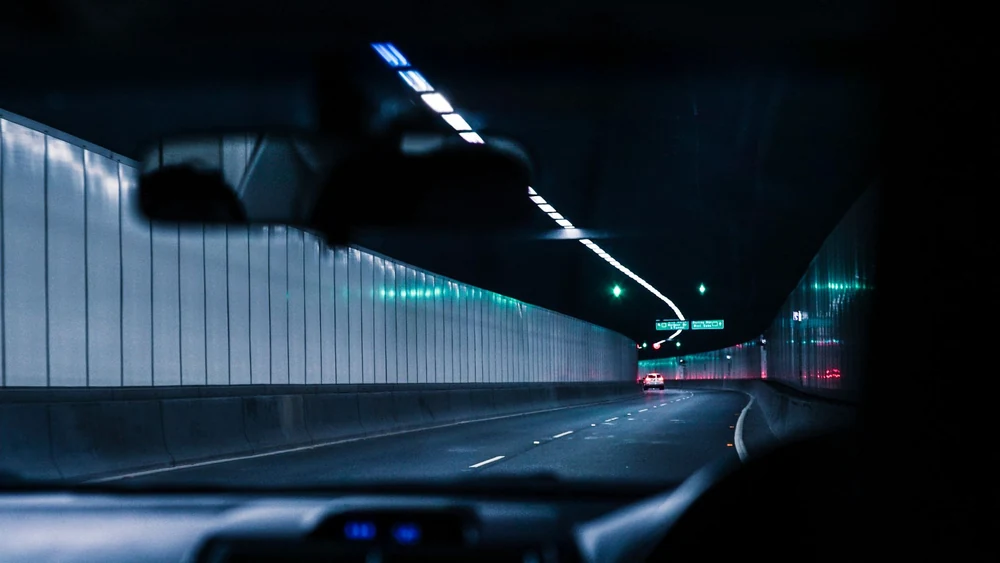 A motorway at night, the unglamorous part of a touring career