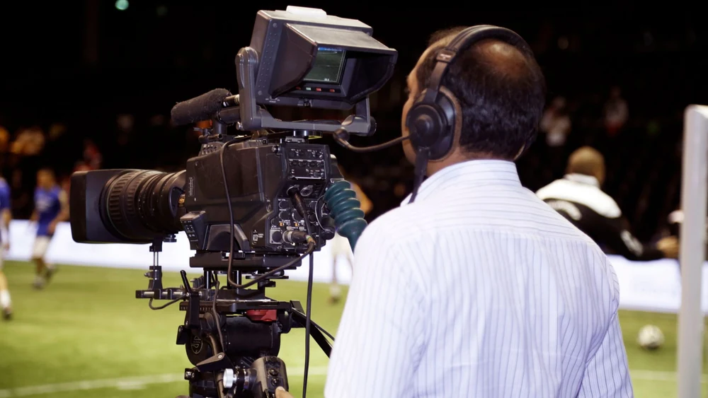 A broadcast camera pitchside, where the money actually comes from