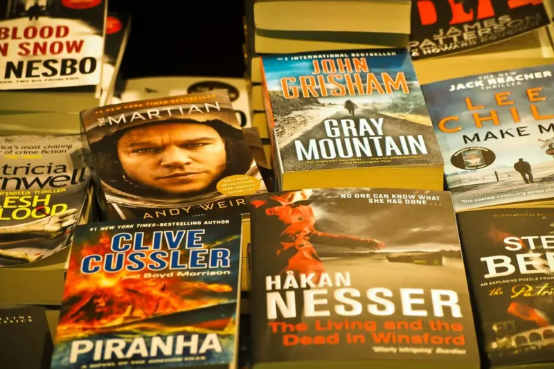 Paperback thrillers on a bookshop shelf