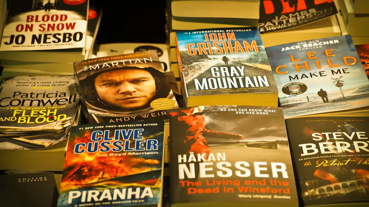 Paperback thrillers on a bookshop shelf