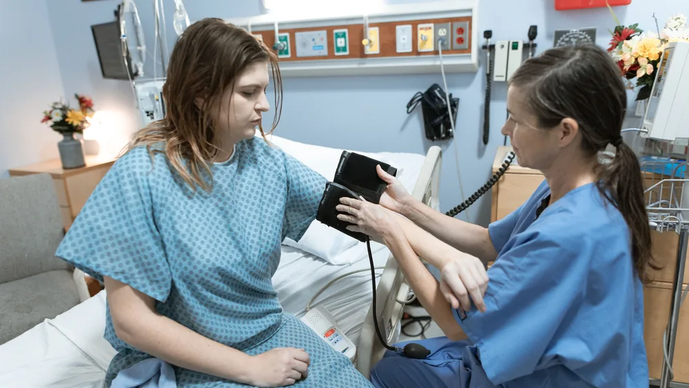Doctor supporting patient