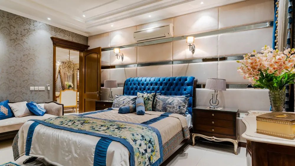 Elegant and luxurious bedroom interior featuring plush bedding