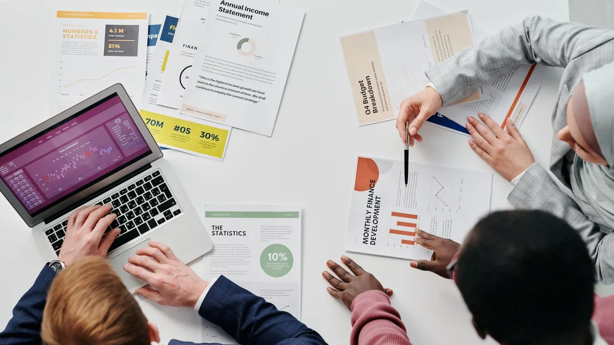 Printed company accounts and financial statements ready to be reviewed