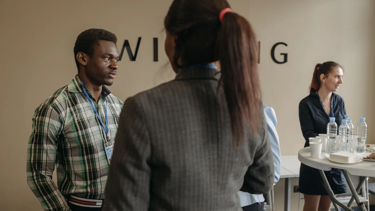 People talking at a business networking event
