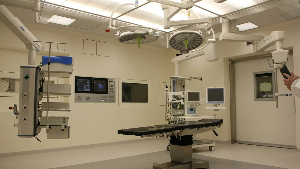 Surgeon using robotic precision technology