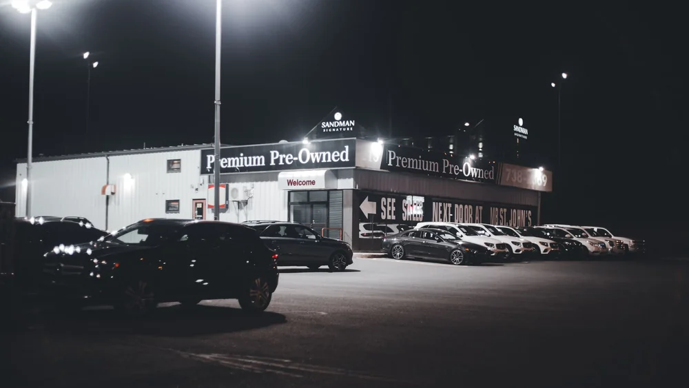 Used cars lined up on a dealership forecourt