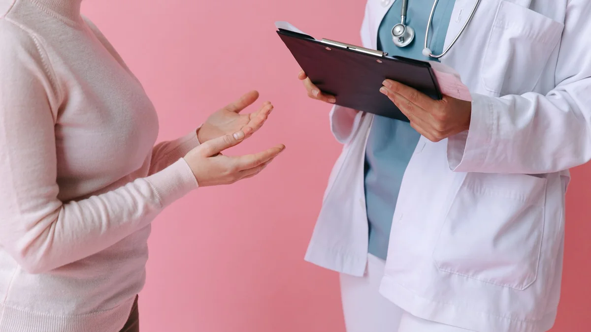 A patient in consultation with a doctor at a clinic