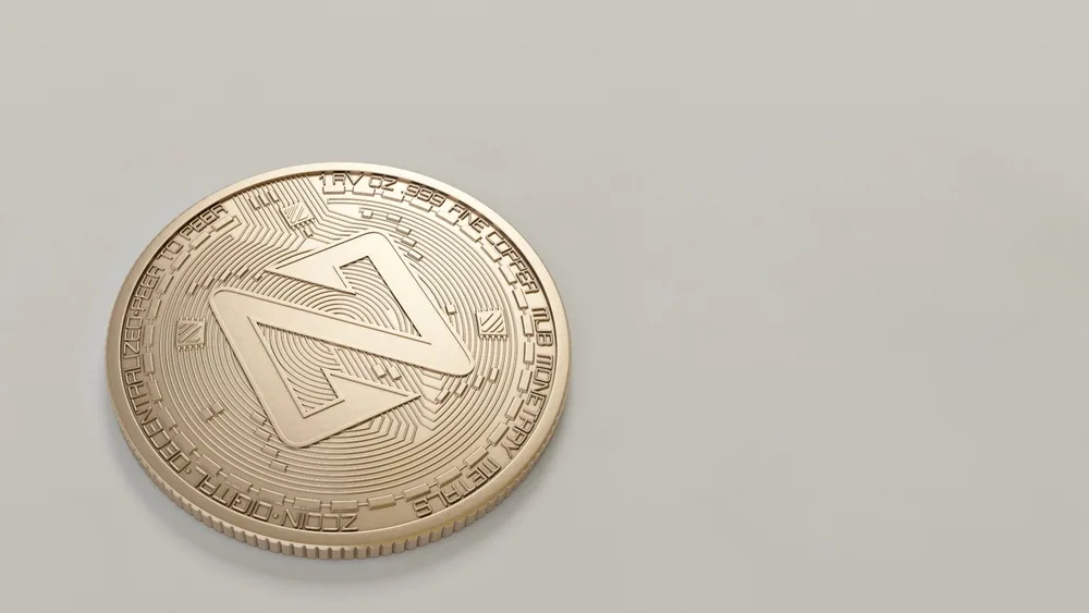 A detailed close-up image of a Zcoin cryptocurrency against a neutral background.