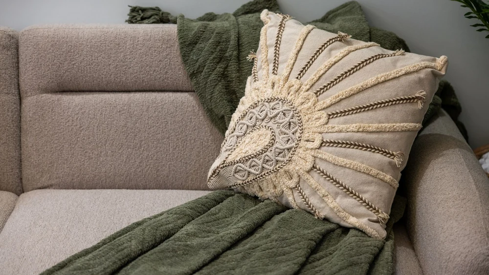 Sage green used as an accent against neutral walls